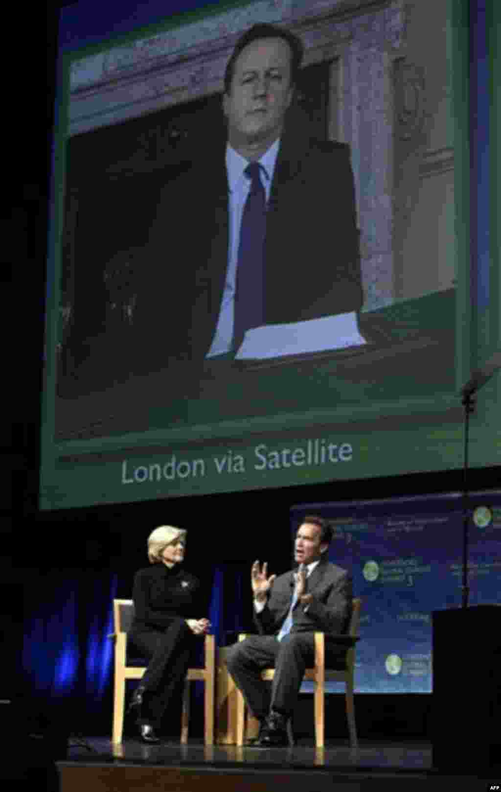 Gov. Arnold Schwarzenegger discusses the environment with NBC Chief Environmental Affairs Correspondent Anne Thompson, during the second day of the Governor's Global Climate Summit 3 held at the University of California, Davis, in Davis, Calif., Tuesday,