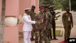 Ghana's Chief of Defence Staff, welcomes Ivory Coast's Chief of Defense staff during the Extraordinary meeting of the Economic Community of West African State (ECOWAS) committee of chiefs of the defense staff in in Accra, Ghana, on August 17, 2023.