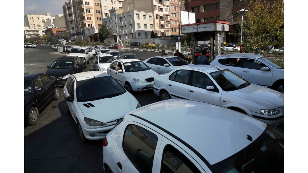 Vehicles line up to enter a gas station in Tehran, Iran, Nov. 15, 2019. Authorities have imposed rationing and increased the prices of fuel.
