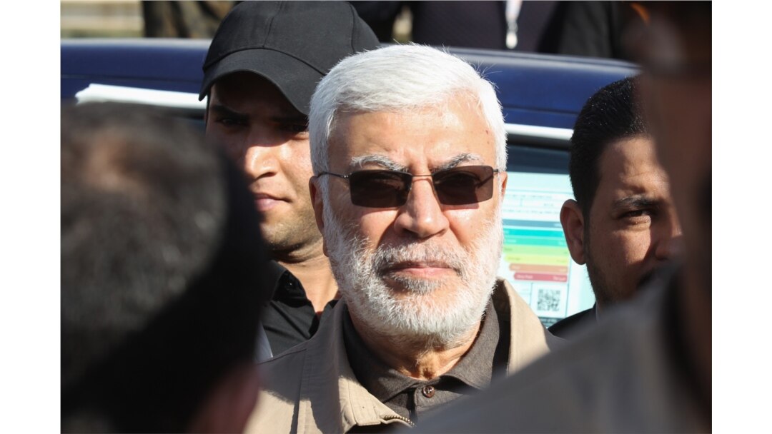 FILE - Abu Mahdi al-Muhandis, a commander in the Popular Mobilization Forces, attends the funeral procession of Hashed al-Shaabi fighters in Baghdad, Dec. 31, 2019.