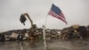 An early-winter storm batters the already hard hit area of Oceanpoint, New Jersey, in this handout photo from the American Red Cross taken November 7, 2012. 