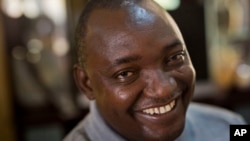 Gambian President-elect Adama Barrow sits for an interview with the Associated Press at his residence in Yundum, Gambia, Dec. 3, 2016.