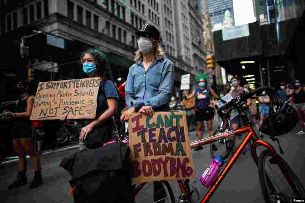 People take part in a march during the National Day of Resistance to schools re-opening amid the outbreak of COVID-19 in New York City, Aug. 3, 2020.