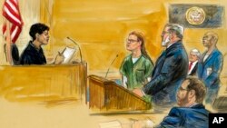 FILE - In this courtroom sketch, Maria Butina (L) is shown next to her attorney Robert Driscoll, before U.S. District Judge Tanya Chutkan, during a court hearing at the U.S. District Court in Washington, Dec. 13, 2018. 