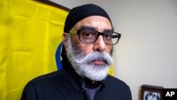 FILE - Sikh separatist leader Gurpatwant Singh Pannun is pictured in his office in New York, Nov. 29, 2023/