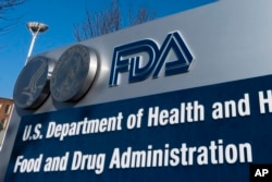 FILE - A sign for the Food and Drug Administration is displayed outside their offices in Silver Spring, Md., on Dec. 10, 2020. Novo Nordisk plans to ask the FDA to approve their weight loss pill later this year. (AP Photo/Manuel Balce Ceneta, File)