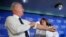 Health and Human Services Secretary Tom Price (L) rolls-up his sleeve before receiving a flu shot from Sharon Walsh-Bonadies, RN. (R), during a news conference in Washington, Sept. 28, 2017.