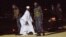 FILE - Gambia's former leader Yahya Jammeh, in white, is seen at Banjul airport, Gambia. Taken Jan. 21, 2017. 