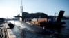 2023년 7월 19일, 미 해군의 탄도미사일 잠수함 ‘켄터키함(USS Kentucky)’이 한국 부산 해군기지에 정박해 있다.