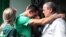 Chapecoense goalkeeper Jose Nivaldo, left, reacts as he talks with Jose Tozzi, who became the team's acting president when his predecessor died in the crash in Chapeco, Brazil, Nov. 30, 2016.