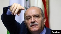 George al-Hajj, president of the federation of syndicates of bank employees gestures during a news conference in Beirut, Lebanon Nov. 18, 2019.