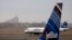 FILE - An A320 Jet Blue plane taxis at JFK airport in New York, March 28, 2014.