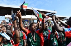 South Sudanese people celebrate as the country marks the 10th anniversary of independence, in Juba, South Sudan, July 9, 2021.