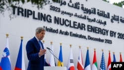 FILE - US Special Presidential Envoy for Climate John Kerry speaks during the Tripling Nuclear Energy by 2050 session at the United Nations climate summit in Dubai on December 2, 2023.