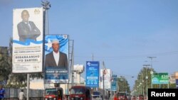 Election banners of Somali presidential candidates are seen along a street in Mogadishu