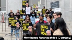 A group of Thai demonstrator holds the portraits of late Vicha Ratanapakdee, during a rally to raise awareness of anti-Asian violence outside the Hall of Justice, SF.