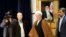 FILE - Former Iranian President Akbar Hashemi Rafsanjani, center, arrives for a press briefing after registering his candidacy for the Feb. 26 elections of the assembly at interior ministry in Tehran, Iran, Dec. 21, 2015. 