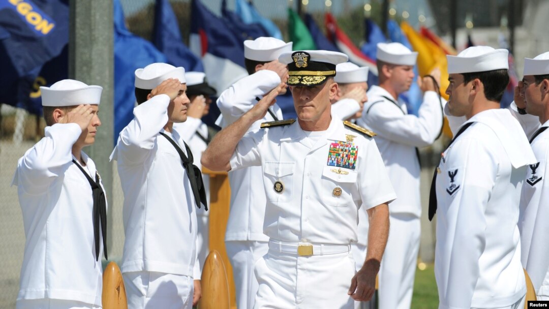 Vice Admiral Robert S. Harward, commander of Combined Joint Task Force 435, salutes during a SEAL Team 5 change of command ceremony in San Diego, California, July 11, 2011.