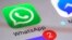 FILE - WhatsApp appears on a smartphone, March 10, 2017, in New York. 