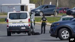 Policija blizu mesta pucnjave u Frederiku, u Merilendu (Foto: AP/Julio Cortez)