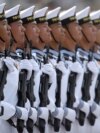 FILE - Soldiers from China's People's Liberation Army (PLA) Navy march in formation during a parade to commemorate the 70th anniversary of the founding of Communist China in Beijing, Oct. 1, 2019. 