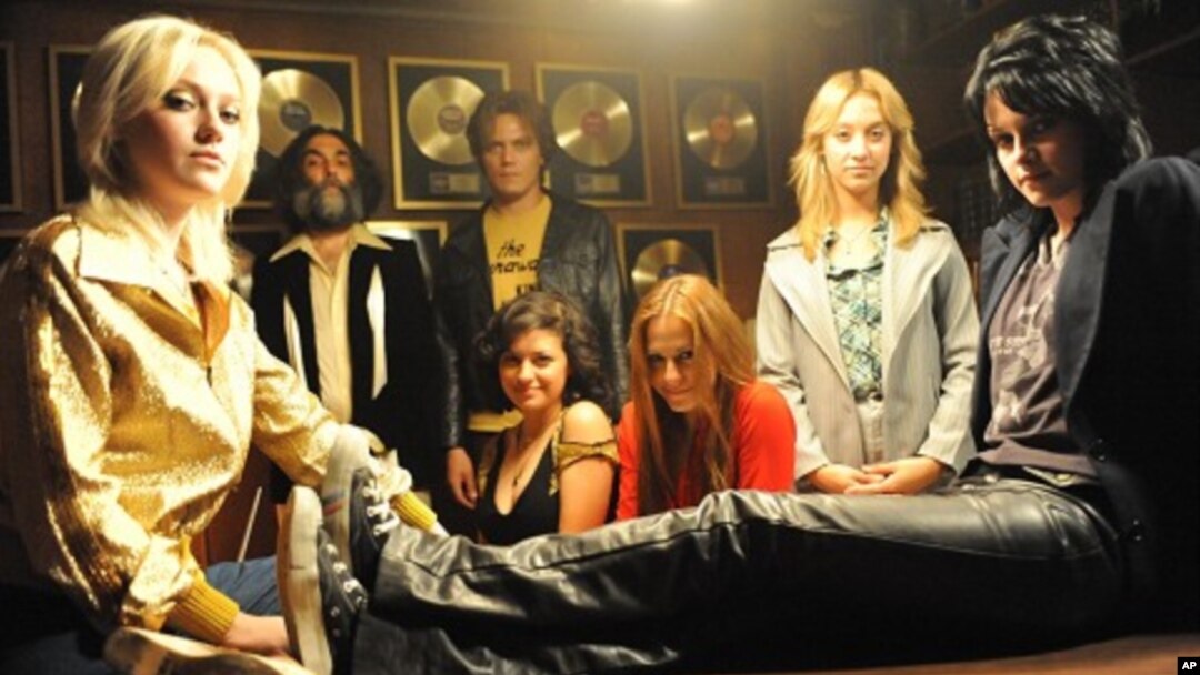 From left to right: Dakota Fanning, Mickey Petralia, Michael Shannon, Alia Shawkat, Scout Taylor-Compton, Stella Maeve and Kristen Stewart in “The Runaways”