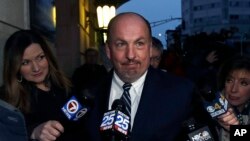 FILE - Former Massachusetts State Sen. Brian Joyce leaves the U.S. federal courthouse in Worcester, Mass., Dec. 8, 2017. Joyce, was awaiting trial on federal corruption charges, was found dead in his Westport, Mass., home Thursday.