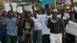 US Officials Clear Officer in Ferguson Shooting
