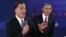 Republican presidential nominee Mitt Romney, left,and President Barack Obama during second U.S. presidential campaign debate, Hempstead, New York, October 16, 2012.