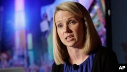 FILE - Marissa Mayer leads the technology firm Yahoo and the list of best-paid women heading U.S. companies.
