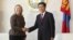 U.S. Secretary of State Hillary Clinton (L) shakes hands with Mongolia's Prime Minister Sukhbaatar Batbold during their meeting at the Parliament Building in Ulan Bator July 9, 2012. REUTERS/Stringer (MONGOLIA - Tags: POLITICS)