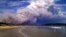 Smoke from a bushfire billows over beach goers at Carlton, about 20 kilometres (12 miles) east of Hobart January 4, 2013. Picture taken January 4, 2013. Bushfires destroyed over 80 homes as temperatures in Australia's island state Tasmania peaked at recor