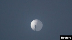 A balloon flies in the sky over Billings