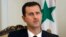 FILE - Syrian President al-Bashar Assad