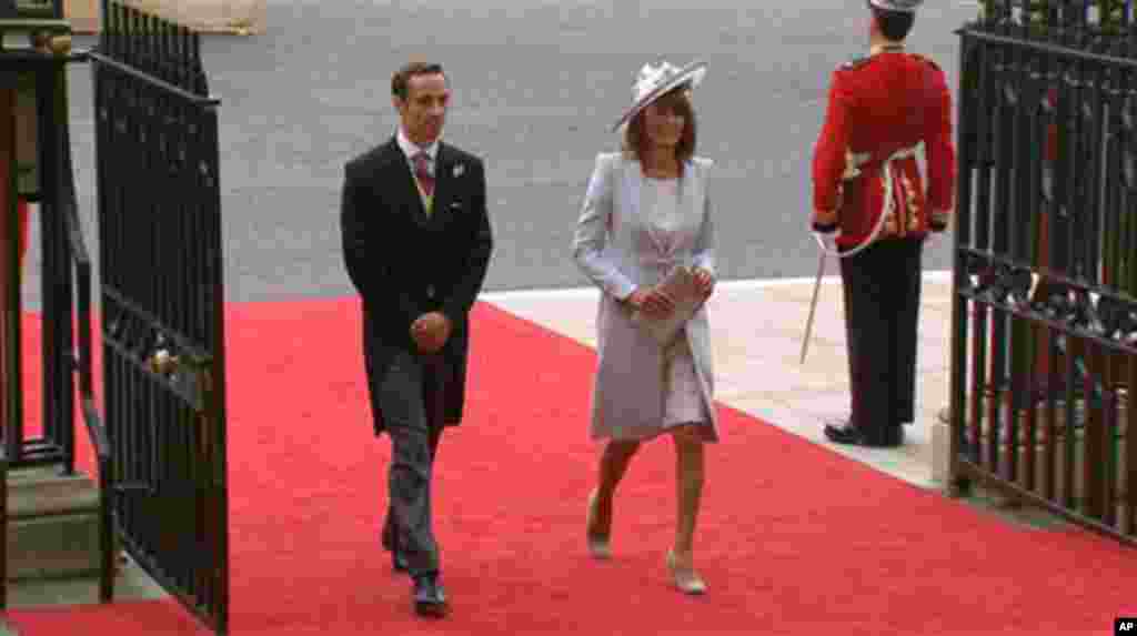 In this image taken from video, Carole Middleton, Kate Middleton's mother, right, and James Middleton, Kate Middleton's brother, arrive at Westminster Abbey for the Royal Wedding, April 29, 2011 (AP Photo/APTN)