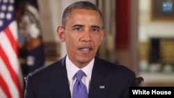 President Barack Obama is seen delivering his weekly address (White House video screen grab).