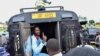 Ugandan presidential candidate Robert Kyagulanyi, also known as Bobi Wine, sits inside a police vehicle in Luuka district, eastern Uganda, Nov. 18, 2020. 