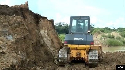 FILE - Mining operations have found gold, zinc, nickel and other materials in the Meiganga, Cameroon, area.