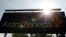 FILE - A sign is seen at an AstraZeneca site in Macclesfield, central England.