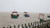 Fishing boats seen floating at Kampot beach, on October 2, 2021. (Sun Narin/VOA Khmer) 