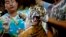 FILE - One of 16 tigers cubs seized from illegal wildlife traffickers. It is believed that this cub was reared in an illegal tiger farm in Thailand and destined for China, Oct. 26, 2012.