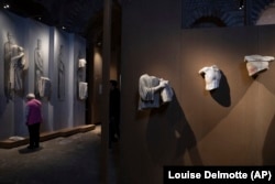 FILE - Medieval sculptures of Notre-Dame cathedral's jube are displayed at the Cluny Museum, National Museum of the Middle Ages, in Paris, on Nov. 27, 2024. (AP Photo/Louise Delmotte, File)