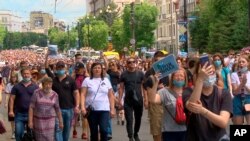 People attend a protest in support of Sergei Furgal, the governor of the Khabarovsk region, who was arrested in Khabarovsk Thursday and flown to Moscow for interrogation, in Khabarovsk, Russia, July 11, 2020.