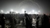 Naga Sadhus or Naked Hindu holy men take dips at Sangam, the confluence of three sacred rivers the Yamuna, the Ganges and the mythical Saraswati, on Vasant Panchami during the Kumbh Mela in Prayagraj, Uttar Pradesh state, India, Feb. 3, 2025.