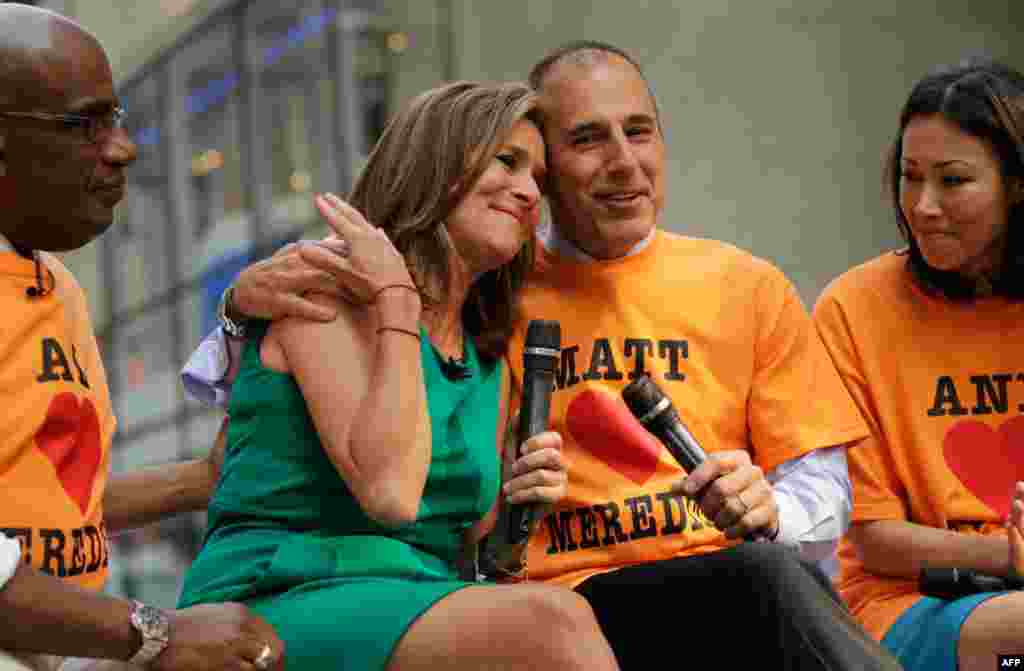 June 8: 'Today' show hosts Al Roker, Meredith Vieira, Matt Lauer and Ann Curry pay tribute during Vieira's final show in New York. (REUTERS/Brendan McDermid)