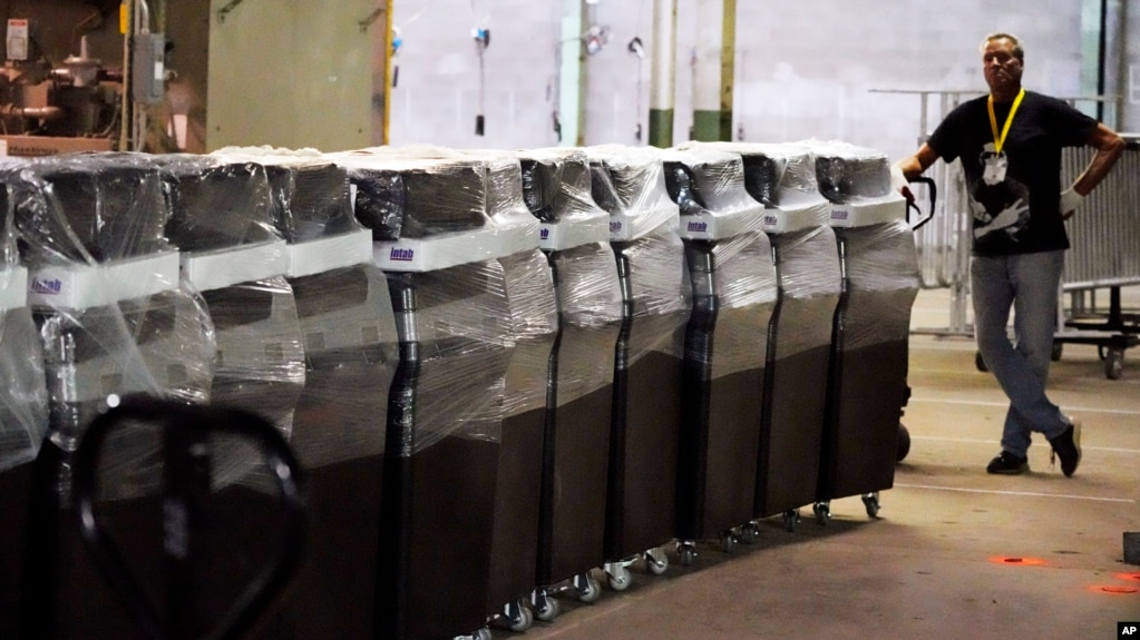 FILE - Voting equipment at the Allegheny County Election Division is prepared to be moved to polling sites.Thursday, Nov. 3, 2022. (AP Photo/Gene J. Puskar, File)