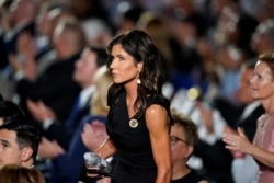 FILE - South Dakota Gov. Kristi Noem stands on the White House lawn during the Republican National Convention in Washington, Aug. 27, 2020.