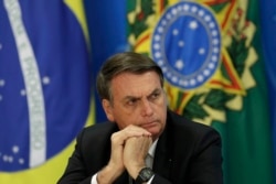 Brazil's President Jair Bolsonaro holds a press conference in Brasilia, Brazil, Aug. 1, 2019.