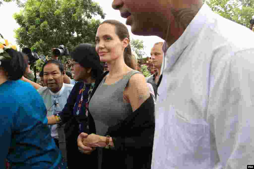 Daw Aung San Suu Kyi and Hollywood atress Angelina Jolie Pitt, United Nations High Commissioner for Refugees special envoy and co-founder of the Preventing Sexual Violence Initiative,visits Yangon, Hlaing Tharyar industrial area to study female workers a