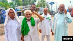 Older farmers hold the fort at the protest site as younger farmers go back to villages in the sowing season. (Anjana Pasricha/VOA)